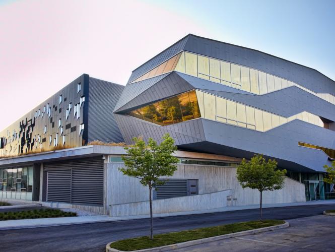An architecturally elaborate building viewed from streetlevel.